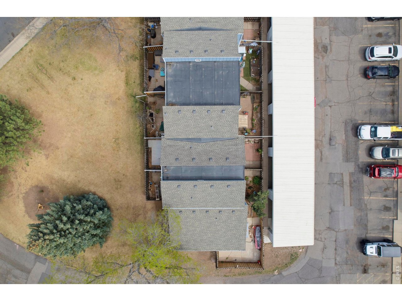 Great grassy area behind the unit is a perfect extension of the patio that acts like a huge backyard!