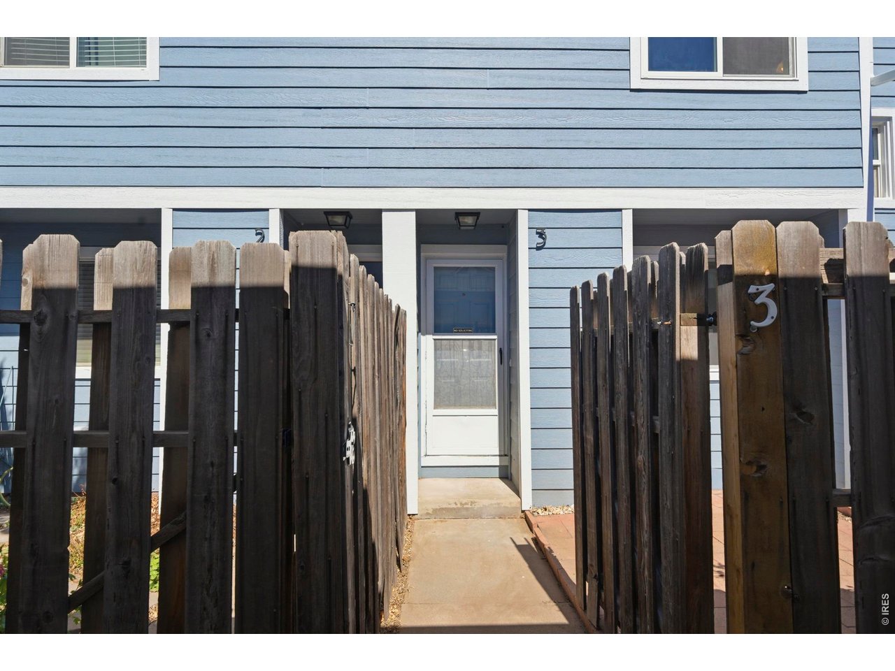 Enclosed front porch helps to add that sense of privacy and outdoor entertaining.