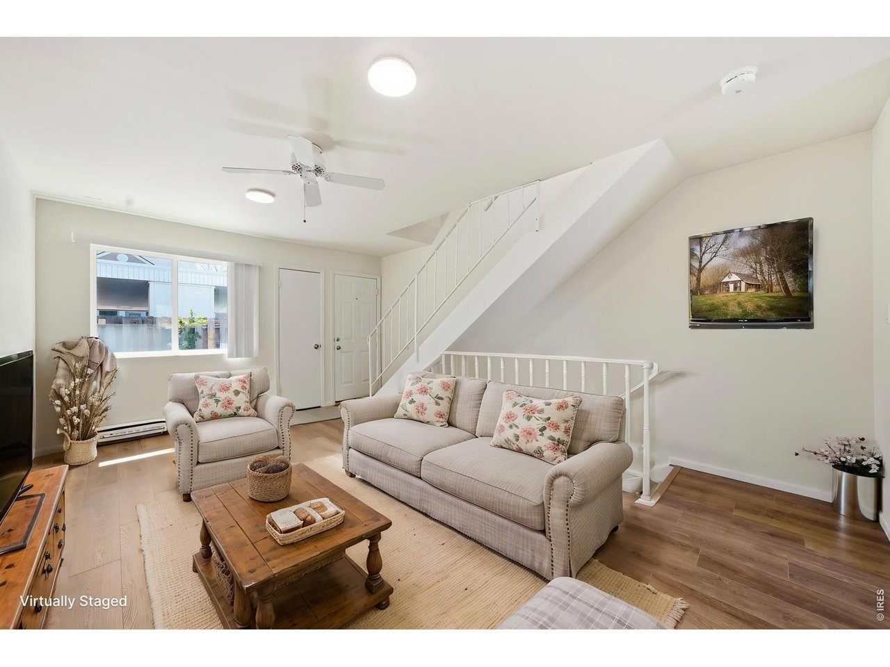 Bright and spacious living room with all with new LVP and paint. ***Virtually staged with AI***