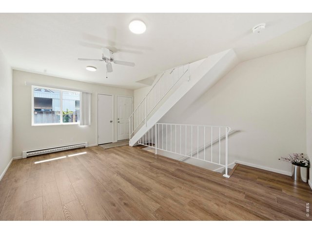 Property Photo 12 Bright and spacious living room with all with new LVP and paint.
