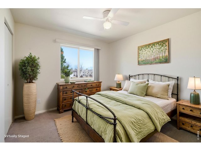 Property Photo 23 Secondary bedroom is appropriately sized as well for kids, guests, or an office. ***Virtually staged with AI***