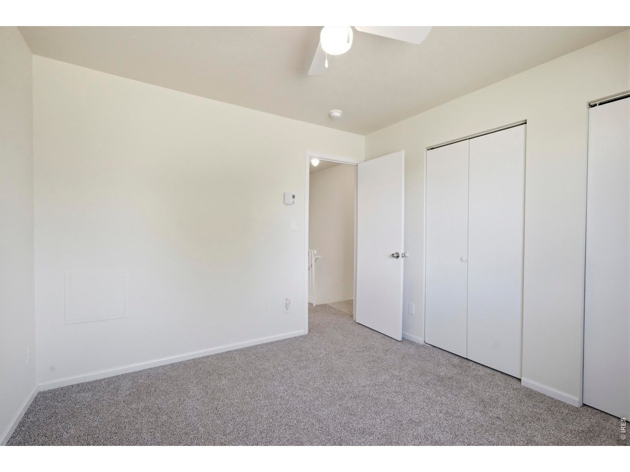 Secondary bedroom is appropriately sized as well for kids, guests, or an office.