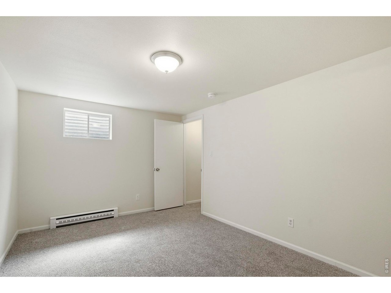 Basement rec room provides a great place to step away from the day to day living area upstairs, or can double as an office.