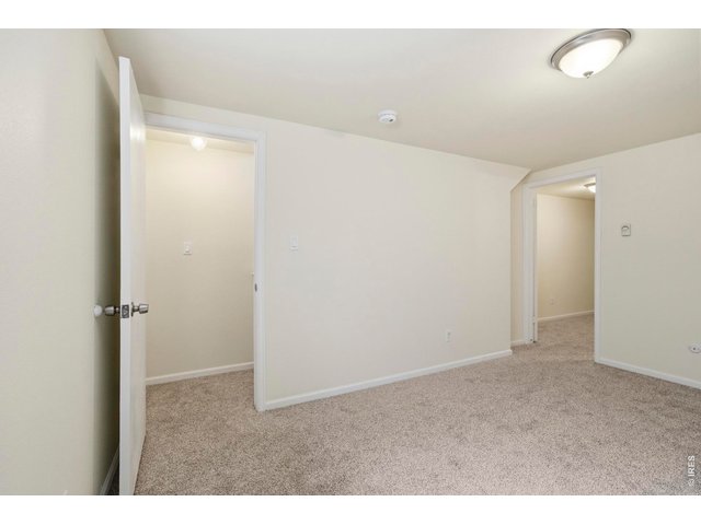 Property Photo 28 Basement rec room provides a great place to step away from the day to day living area upstairs, or can double as an office.