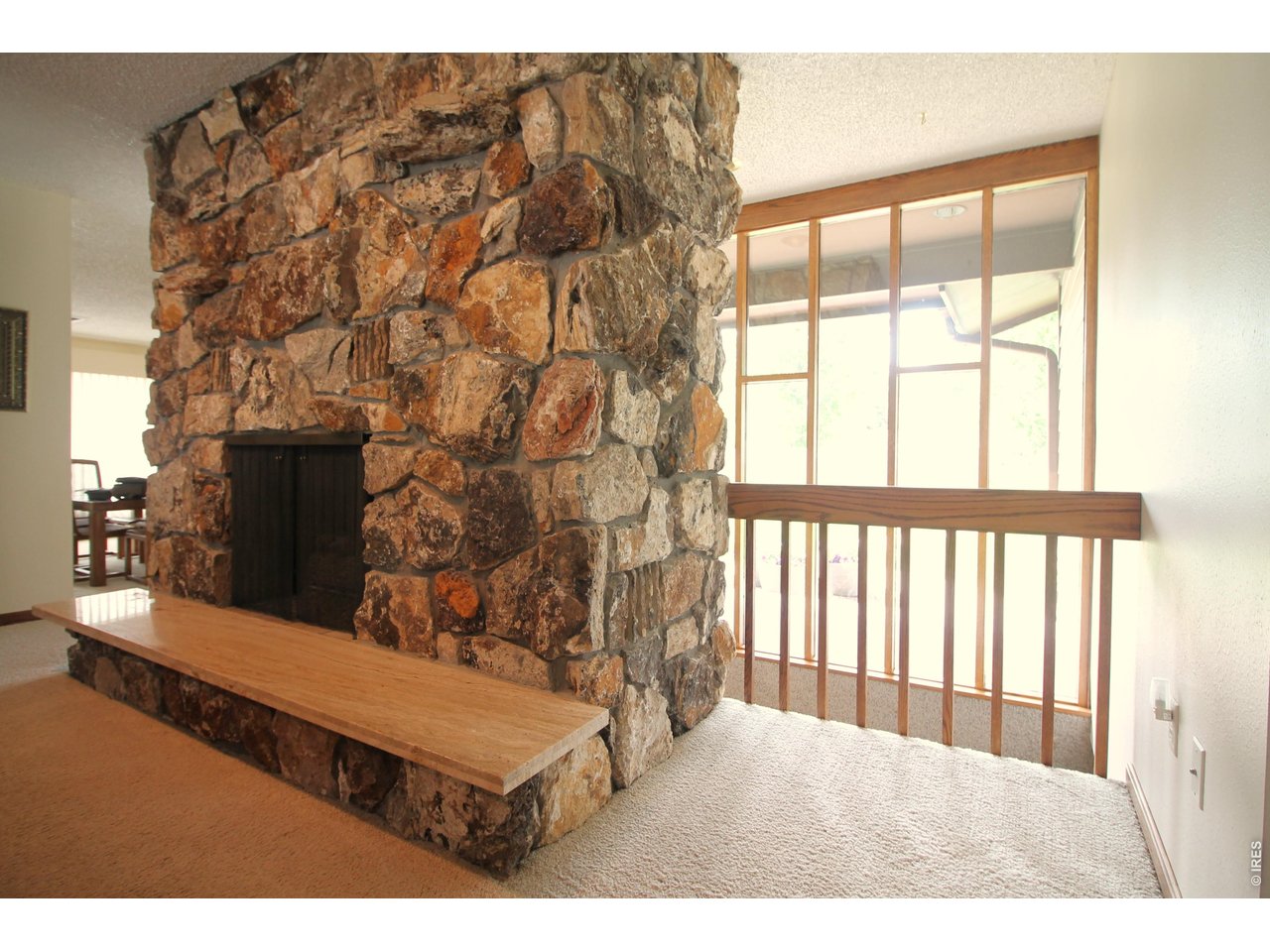 Property Photo 10 Stone fireplace with gas log.