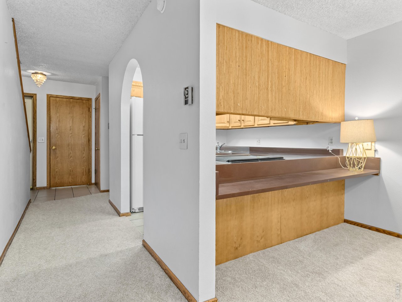 Breakfast bar allows kitchen to be accessible from dining/living area