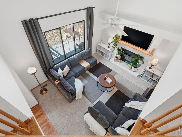 Property Photo 24 Family Room - Bright and spacious living area filled with natural light.