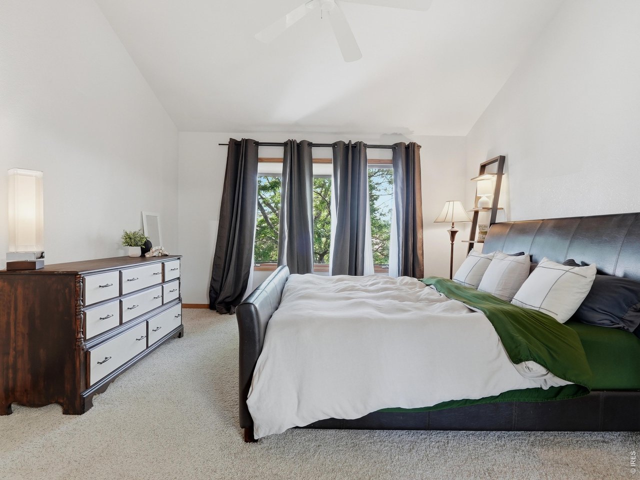 Primary Bedroom - lots of room and plenty of natural light.
