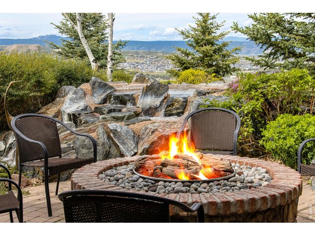 Property Photo 6 Gas Firepit, walkways, patios along with impressive water features