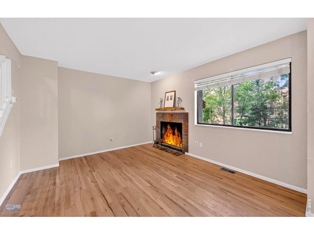 Property Photo 8 Living Room - wood burning fireplace