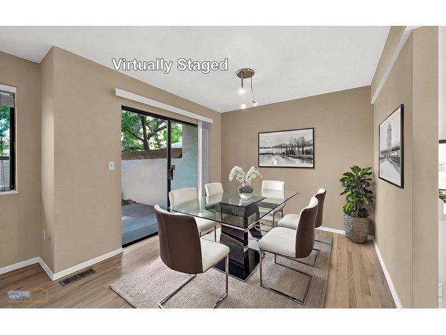 Property Photo 13 Dining area virtually staged