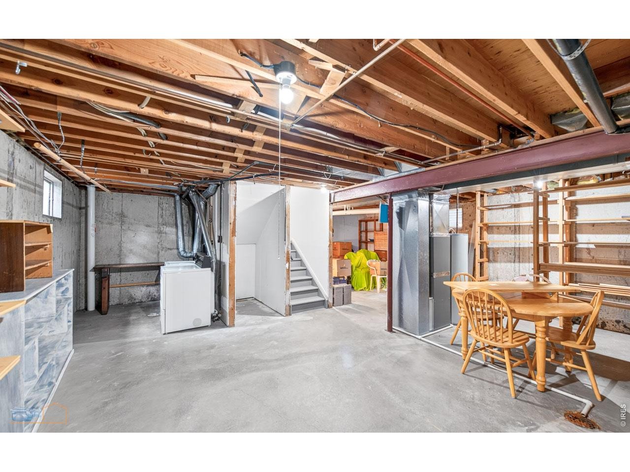 Unfinished basement and laundry area