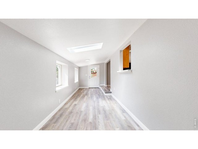Property Photo 10 Sun Room or 4th Bedrm Noncomforning w/Sunlight
