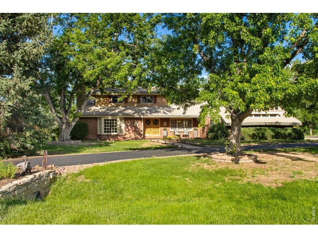 Property Photo 4 These grounds transport you, allowing an exhale throughout the abundant natural beauty of the great outdoors, a unique and gorgeous offering with nearly 3,600 SF above grade and 5,100 total SF.