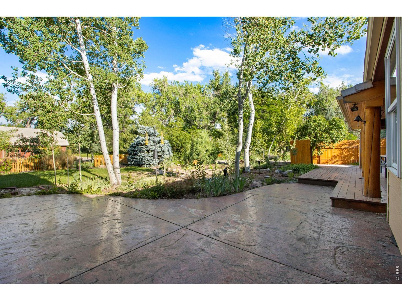 447 SF stained and stamped concrete patio for a variety of entertaining options! 