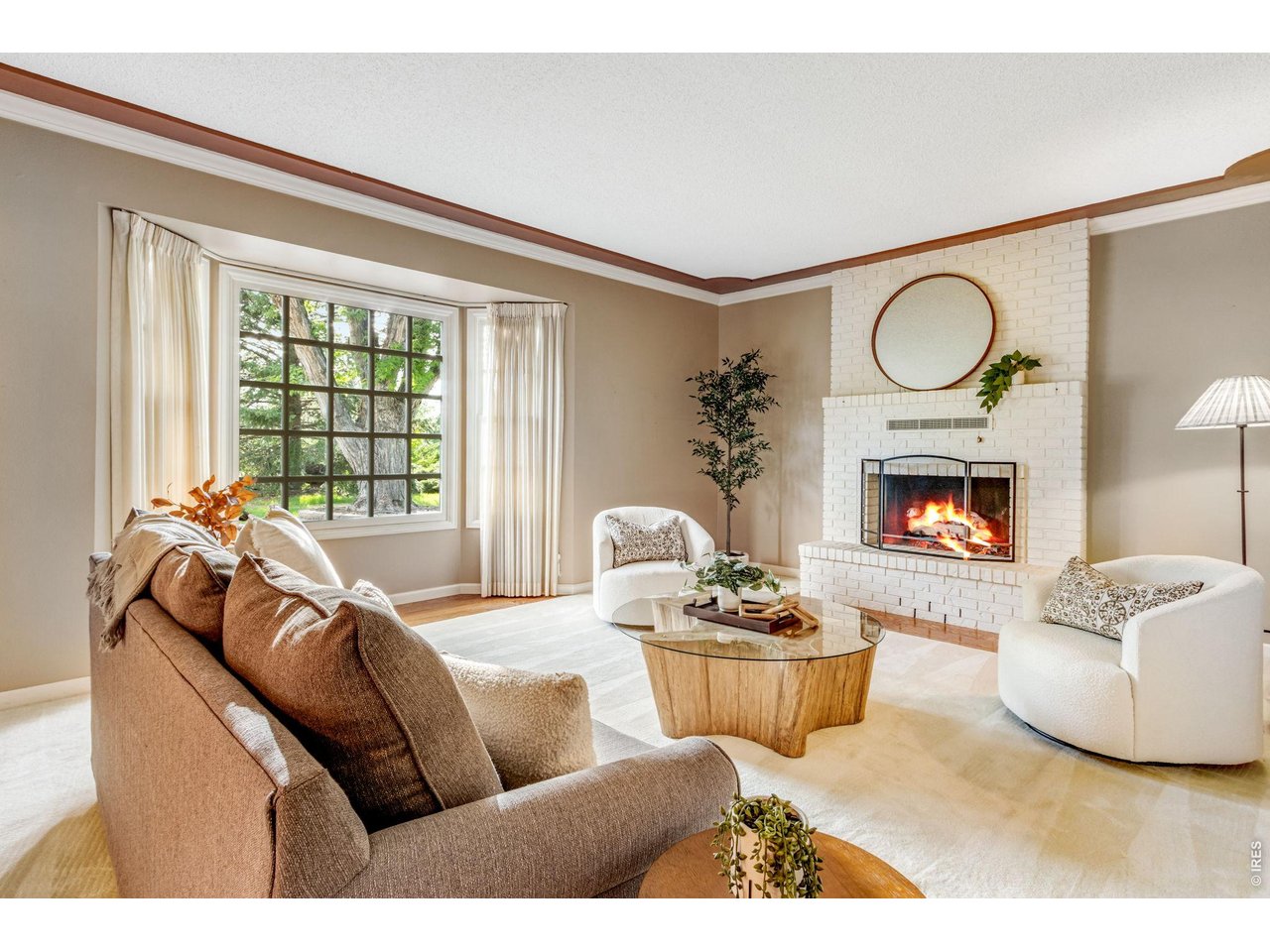 Abundant sunny living space with gas fireplace to the north side 