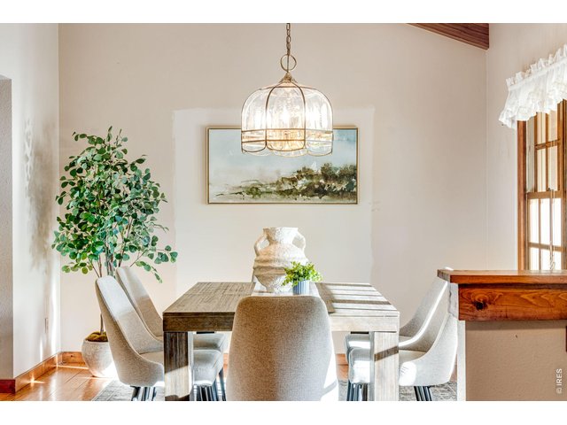 Property Photo 16 Vaulted beamed ceiling, bathed in natural light! 