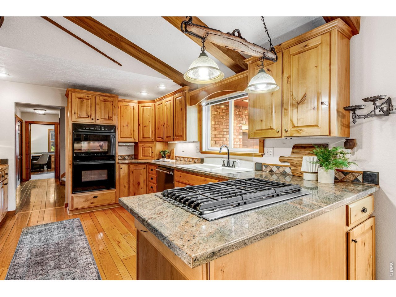 Phenomenal Epicurean's kitchen with THARP hickory cabinetry, Gourmet Kitchen appliances (5 burner gas cooktop) Slab Granite, loaded w/ storage + workspace.