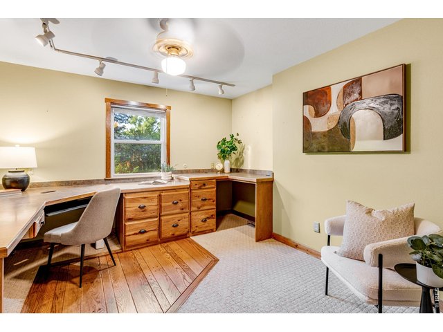 Property Photo 31 Spacious Main floor office, and convenient built-ins! The perfect work from home environment! 