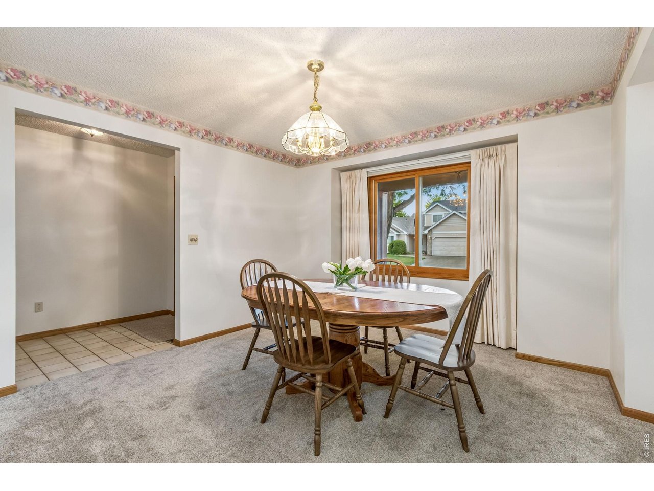 Property Photo 21 A separate formal dining room provides an elegant setting for holiday dinners, celebrations, and memorable gatherings with family and friends