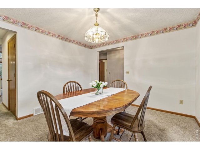 Property Photo 23 formal dining room provides additional gathering space for creating memories