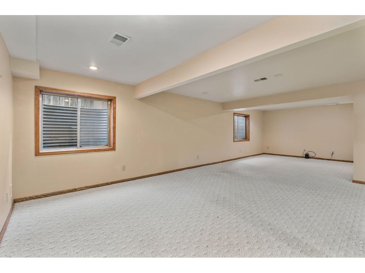 Property Photo 34 Endless possibilities to create a cozy space! The finished basement for added flexibility. 