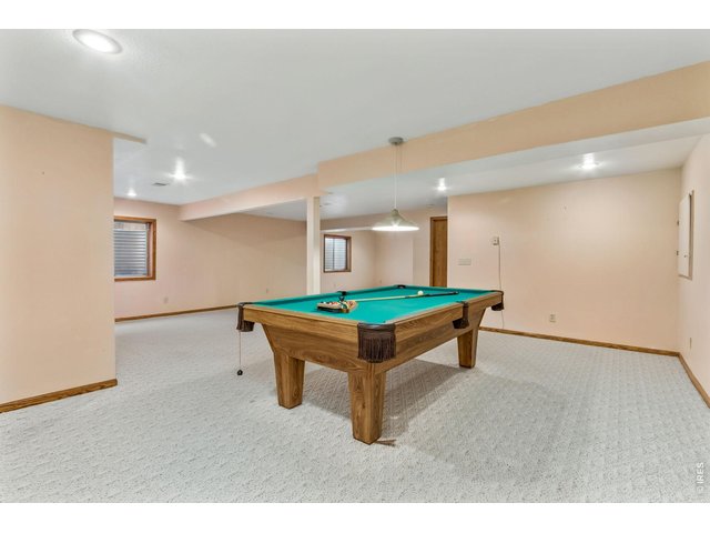 Property Photo 33 A Perfect space to play pool, watch movies, have some fun! Pool table is included! 