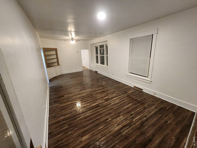 Property Photo 3 Front House Living and Dining Room