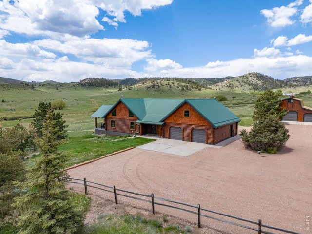 Property Photo 1 Welcome to 11881 W County Road 74E! An incredible 145 acre property backing to thousands of acres of National Forest!