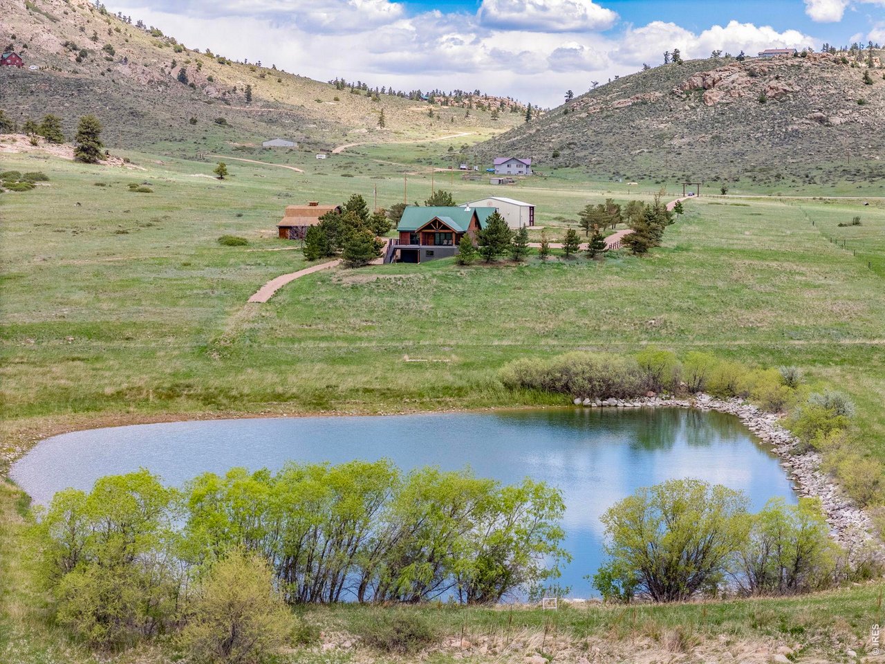 Property Photo 2 Featuring a stocked trout pond!