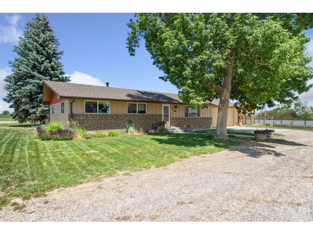 Property Photo 2 Front of House with Mature Trees