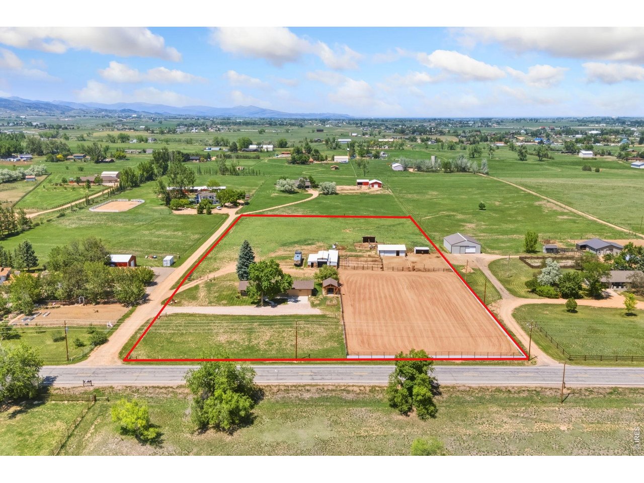 Property Photo 1 Aerial View Looking North From Paved Frontage, Approximate Property Outline