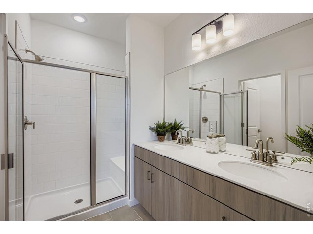Property Photo 18 The primary bathroom - Model Home