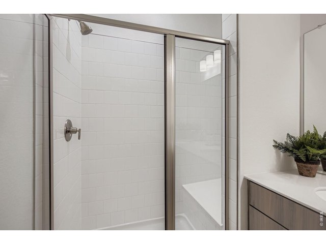Property Photo 19 Primary shower - Model Home