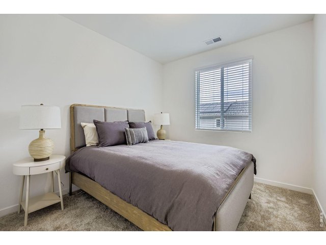 Property Photo 22 Bedroom 2 - Model Home