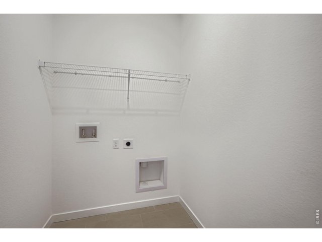 Property Photo 27 Laundry room - Model Home