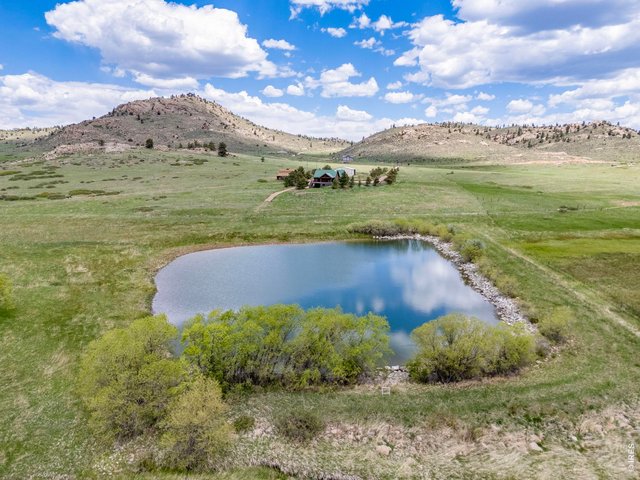 Property Photo 44 1.5-acre stocked trout pond as your backyard centerpiece.