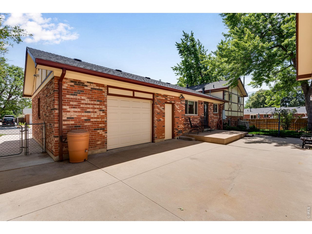 Property Photo 4 Pull through garage doors on back of garage for access to shop