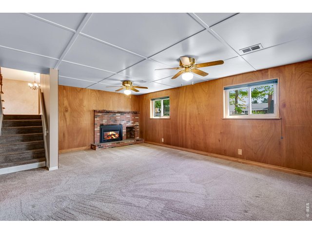 Property Photo 25 Lower level Family room with fireplace
