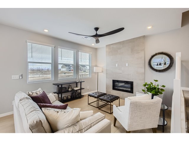 Property Photo 4 Centered by a gas fireplace - Model Home
