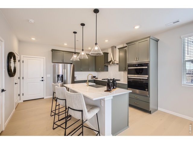 Property Photo 6 Sleek counters and modern finishes - Model Home