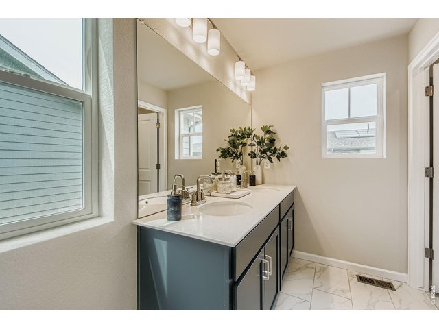 Property Photo 13 The primary bathroom - Model Home