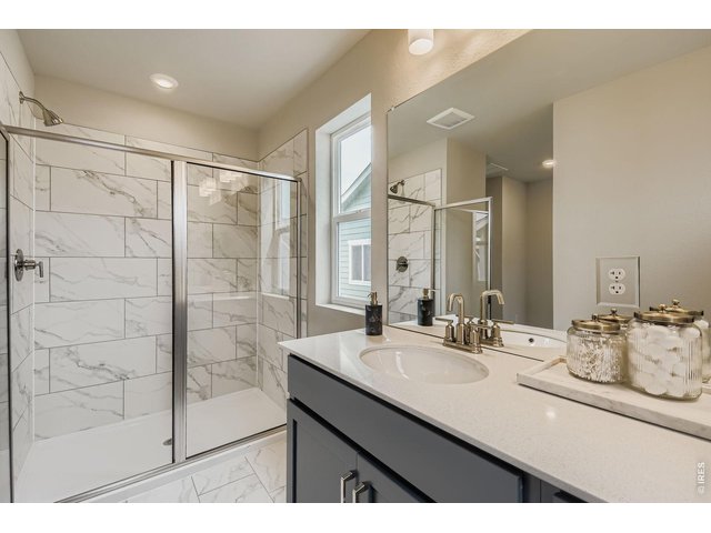 Property Photo 17 Primary shower - Model Home