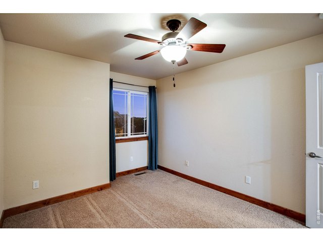 Property Photo 25 Bedrooms 2 and 3 with ceiling fans