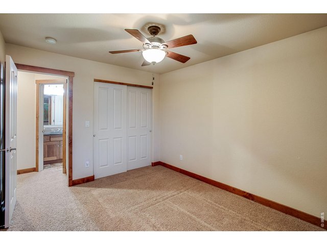 Property Photo 27 Bedrooms 2 and 3 with ceiling fans