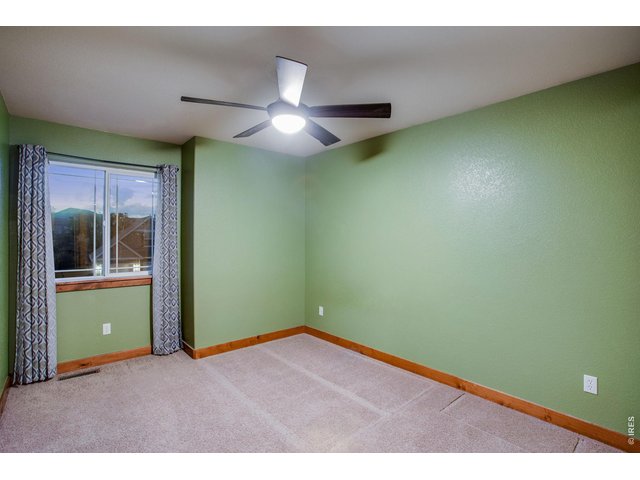 Property Photo 28 Bedrooms 2 and 3 with ceiling fans