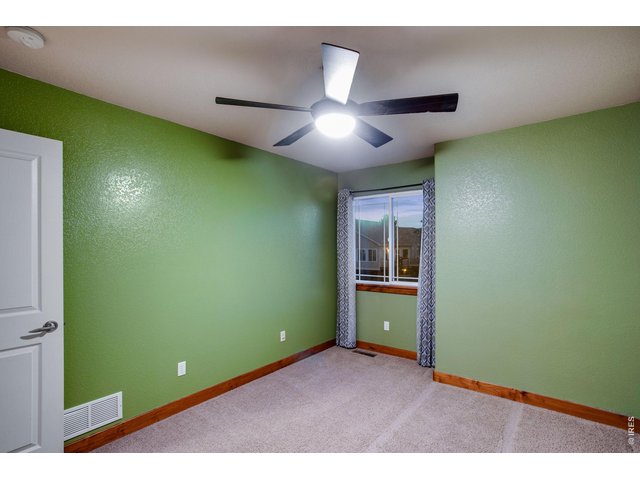 Property Photo 30 Bedrooms 2 and 3 with ceiling fans