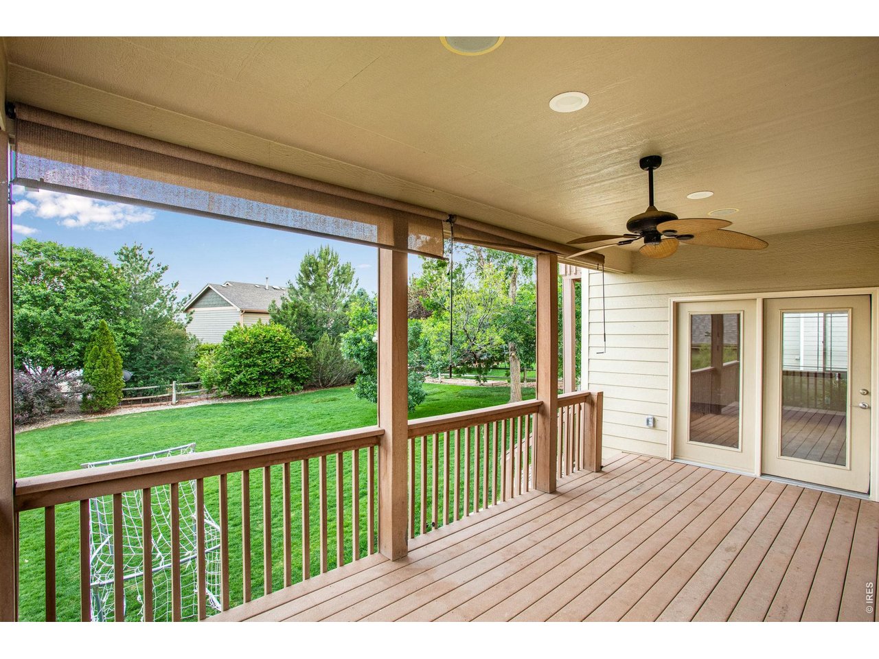Property Photo 6 Situated on a .232-acre professionally landscaped lot with mature trees, fencing, sprinkler and drip system, raised garden, stone masonry work, southern exposure, and upgraded lighting. 
