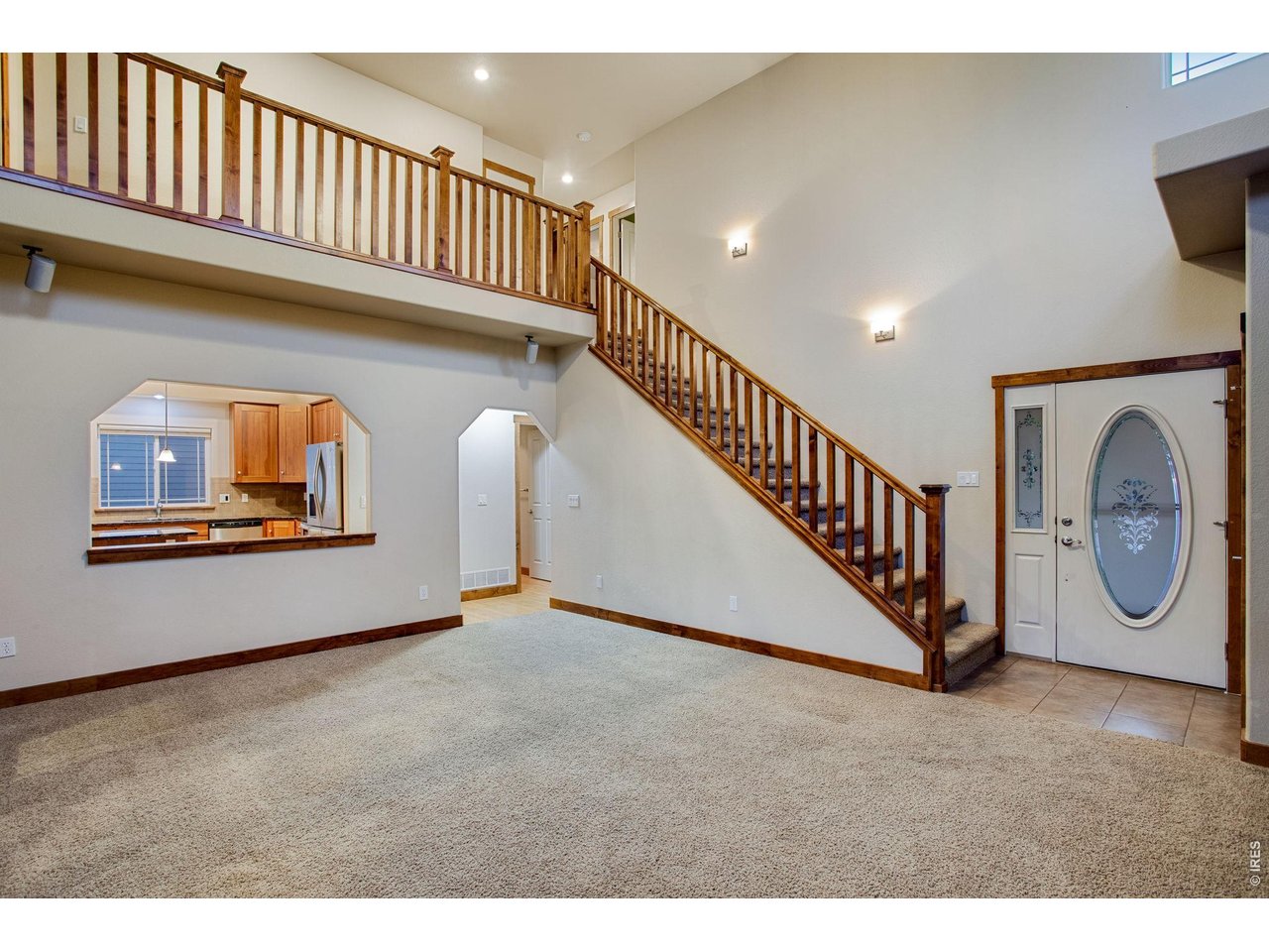 Property Photo 7 Spacious foyer with tile landing and coat closet