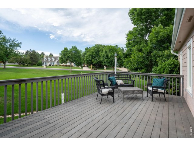 Property Photo 42 The expansive deck is low maintenance and is overlooking the expansive greenbelt. 